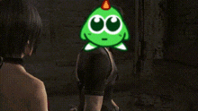 a woman is singing into a microphone while a green frog is behind her .