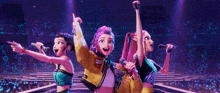 three cartoon girls are singing into microphones on a stage in front of a crowd .