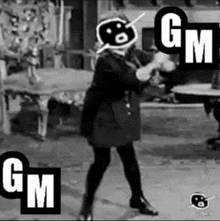 a black and white photo of a woman dancing with the letters gm and gm in the background