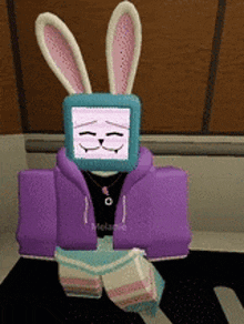 a cartoon character wearing a purple hoodie and bunny ears .