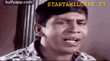 a close up of a man 's face with the words starttamilchat in the upper right corner