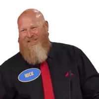 a bald man with a beard wears a name tag that says nick