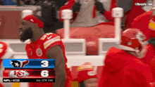 a football game between the kansas city chiefs and the denver broncos is underway