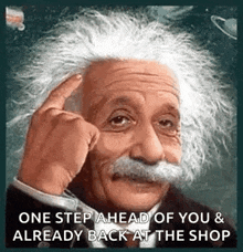 a picture of albert einstein with a mustache pointing at his head .