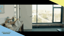 an ad for freelancers anonymous shows a dog laying on its back on a counter