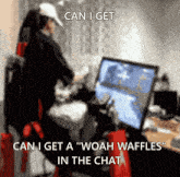 a blurred image of a man sitting in front of a computer with the caption " can i get a woah waffles "