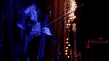Playing Cello Strings GIF - Playing Cello Strings Preparing For Music GIFs