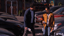 a man and a woman are standing in front of a co-op