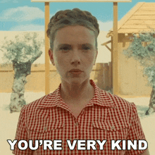a woman in a red and white plaid shirt says you 're very kind