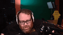a man wearing headphones and a shirt that says cyberpunk on it