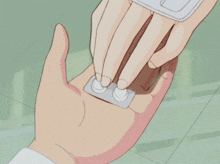 a person is taking a pill from another person