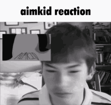 a black and white photo of a person with the words aimkid reaction above them