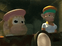 two cartoon characters are sitting in a car .