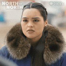 a woman wearing a fur coat with the words north of north written on the bottom