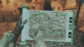 a person is holding a map of the foreigner lands
