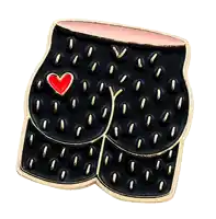 a pin that looks like a butt with a heart in the middle