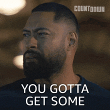 a man with a beard says " you gotta get some " in front of a countdown logo