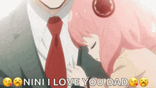 a girl with pink hair is hugging a man with the words " nini i love you dad " above her