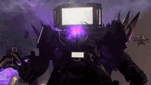 a large robot with a purple light coming out of it 's head