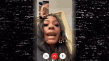 a woman is on a video call with another person