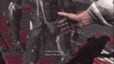 a person is pointing at a person in a video game .