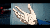 a cartoon hand is reaching out towards a wall .