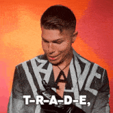 a man giving a thumbs up with the words t-r-a-d-e written on the bottom