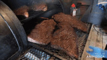 a large amount of meat is being cooked in a smoker with the words made in animotica visible