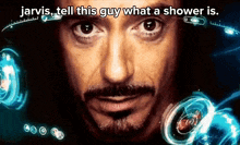 a close up of a man 's face with jarvis tell this guy what a shower is