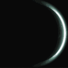 a drawing of a crescent moon with a blue and black background