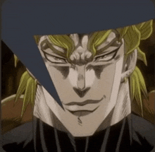 a close up of dio from jojo 's bizarre adventure with a speech bubble on his face