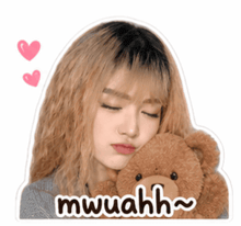 a sticker of a girl holding a teddy bear with the words mwuahh below her