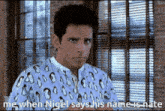 a man wearing a shirt with penguins on it says me when nigel says his name is nate ..