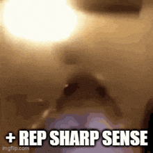 a close up of a person 's face with the words rep sharp sense below it