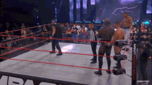 a wrestling ring with a sign that says impact wrestling on it