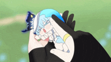 a cartoon of a person holding a blue ball with a butterfly on it 's head