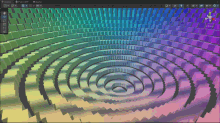 a computer screen shows a rainbow colored background with a circle in the center