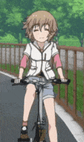 a cartoon girl is riding a bike on a road