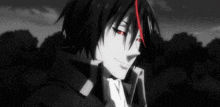 a black and white photo of a anime character with red eyes and a smile on his face .