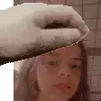 a pixelated image of a woman 's face with a cat 's paw on it .