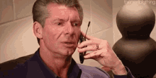 Vince Mcmahon Try Not To Laugh GIF - Vince Mcmahon Try Not To Laugh Hold GIFs