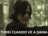 a picture of a man with the words " torki cuando ve a dania " on the bottom