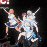 a group of anime girls are dancing on a stage in front of a sign that says anniversary live