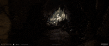 a dark cave with the word skydance on the bottom right