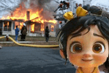 a cartoon doll is standing in front of a burning house .