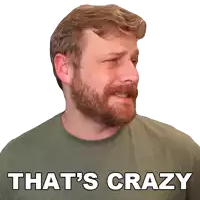a man with a beard is wearing a green shirt with the words that 's crazy on it