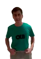 a man is wearing a green shirt with the word olb on it