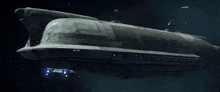 a large space ship is flying through the night sky