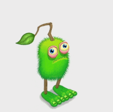 a green monster with a leaf on its head and feet