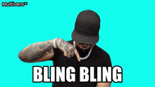 a man wearing a ny hat and a bling bling shirt